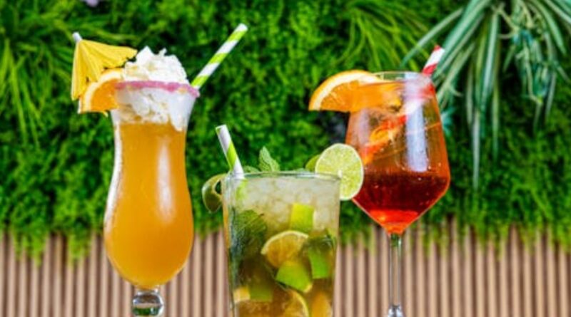 A detailed Jamaican Rum Cream recipe displayed on a rustic wooden table, highlighting key ingredients and preparation steps.