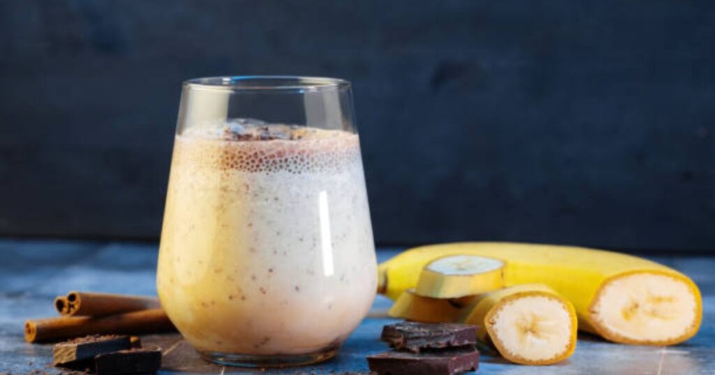 learn How to Make a Banana Date Smoothie and in these picture  A vibrant smoothie made with ripe bananas and cinnamon, showcasing a perfect blend of taste and nutrition.