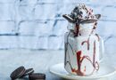 Oreo milkshake topped with chocolate drizzle and whipped cream, inspired by Chick-fil-A's creamy recipe.