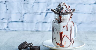 Oreo milkshake topped with chocolate drizzle and whipped cream, inspired by Chick-fil-A's creamy recipe.